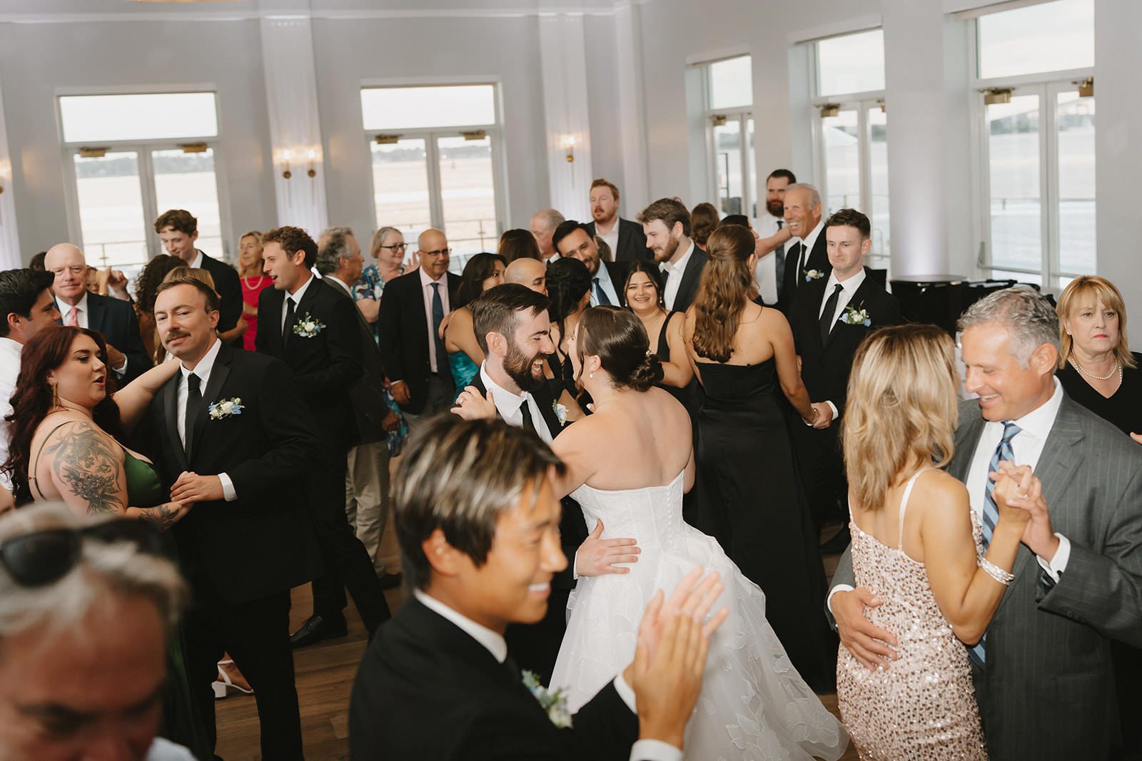 Dancing with ocean views at Newport Harbor wedding photographer Madison Van Wylen