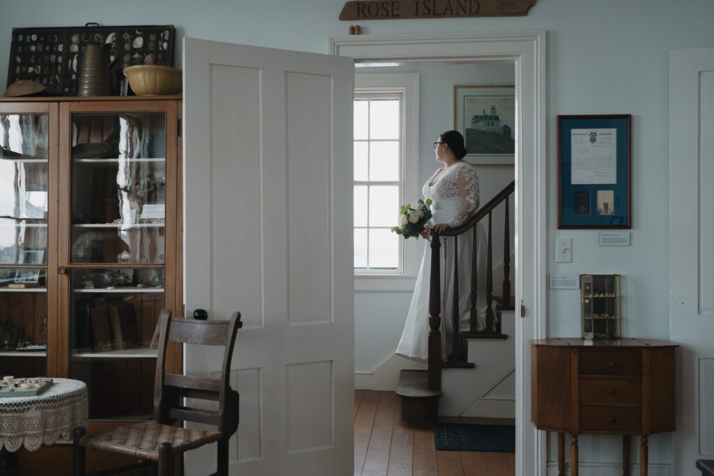 Bride getting ready inside the Rose Island Lighthouse hotel keeper's quarters