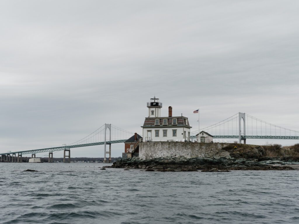 Wedding ceremony on Narragansett Bay with the Pell Bridge in the background