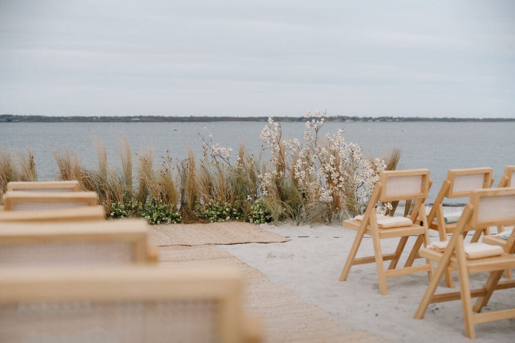 Guests gathered on the sand at Third Beach for a micro wedding